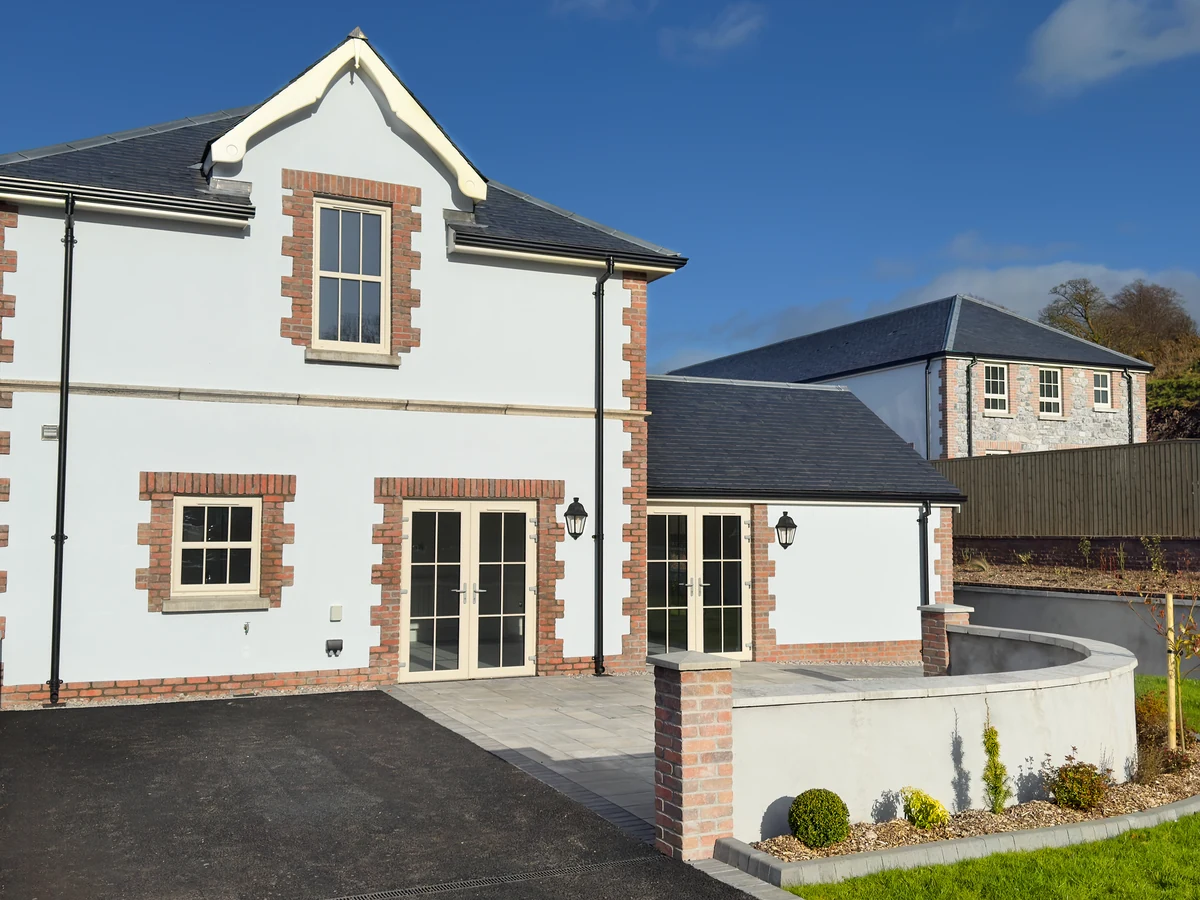 exterior-painting-newbuild-white-rendered-bridgend-decorators New build white rendered house freshly painted in Bridgend